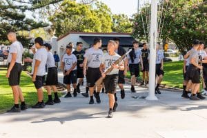 Army & Navy Academy cadets in uniform participate in an outdoor drill.