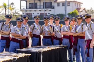 group og middle school students wearing military uniform